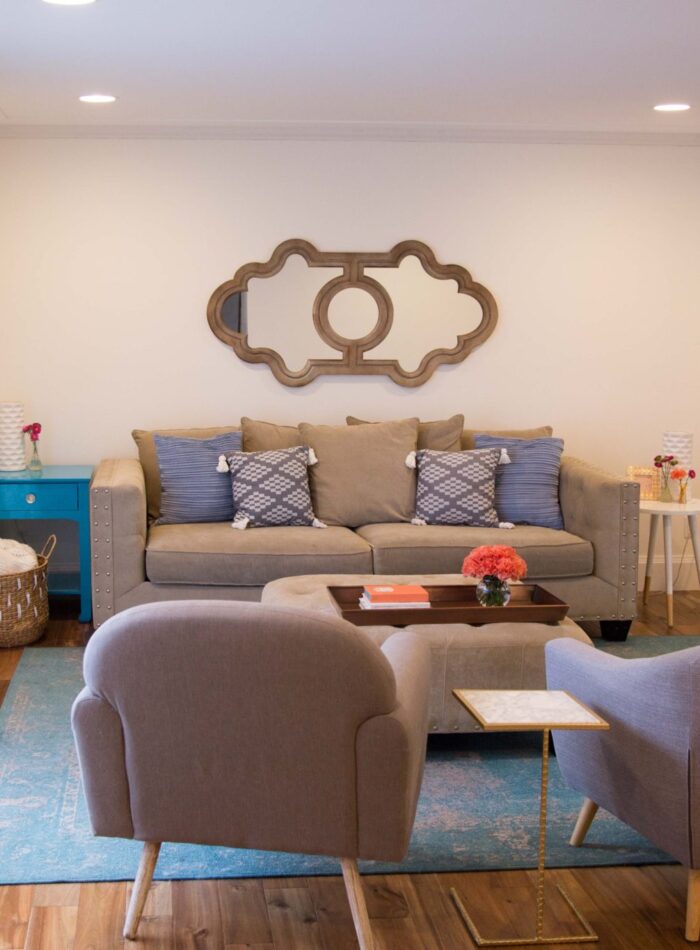 our living room refresh on allweareblog.com | fixer upper | midcentury remodel | blue vintage rug