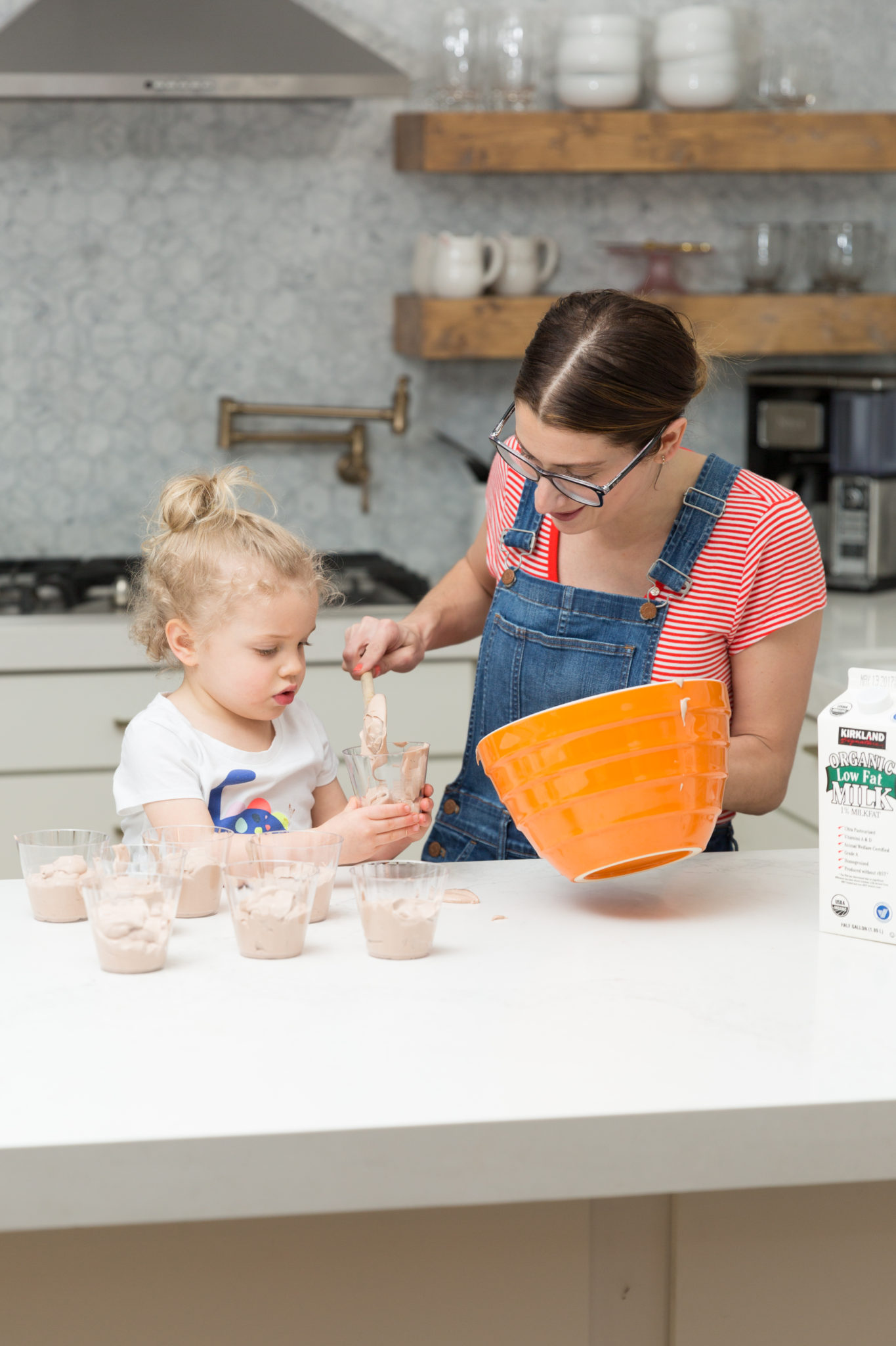 How to make dirt cups for earth day | easy desserts you can make with toddlers | how to get your toddler to help in the kitchen on allweareblog.com